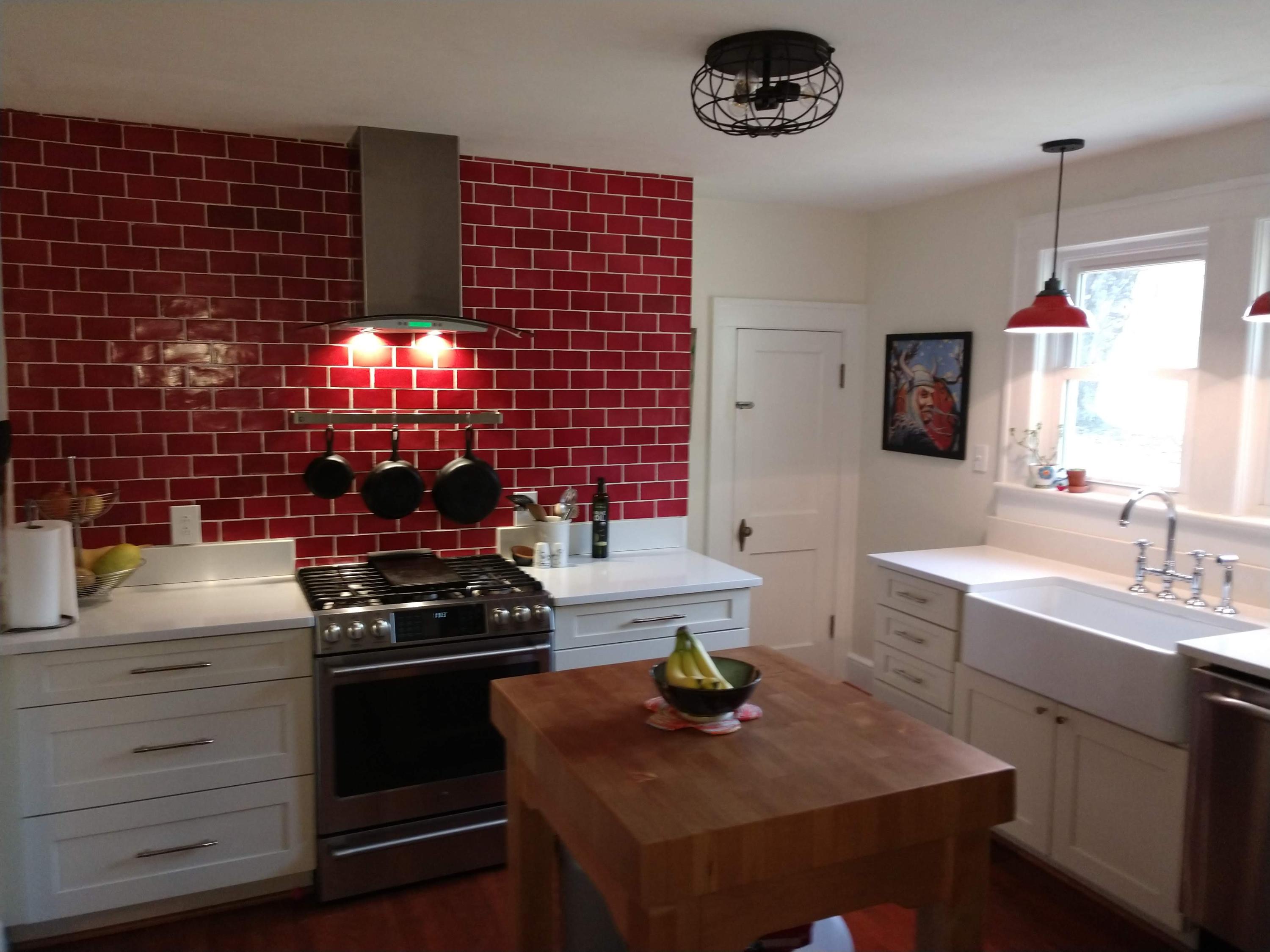 7909 Bear Ridge Road Southeast Copper Hill, VA 24079 - Photo 14 of 61 a kitchen with a stove and a sink