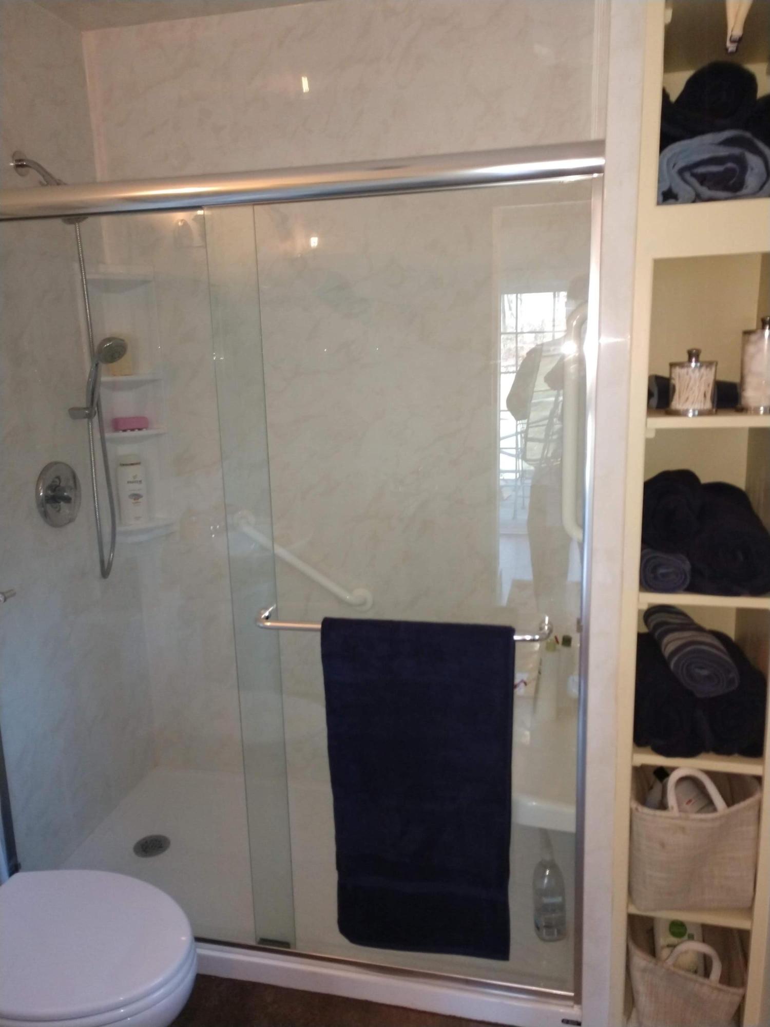 7909 Bear Ridge Road Southeast Copper Hill, VA 24079 - Photo 23 of 61 a bathroom with a shower and a toilet
