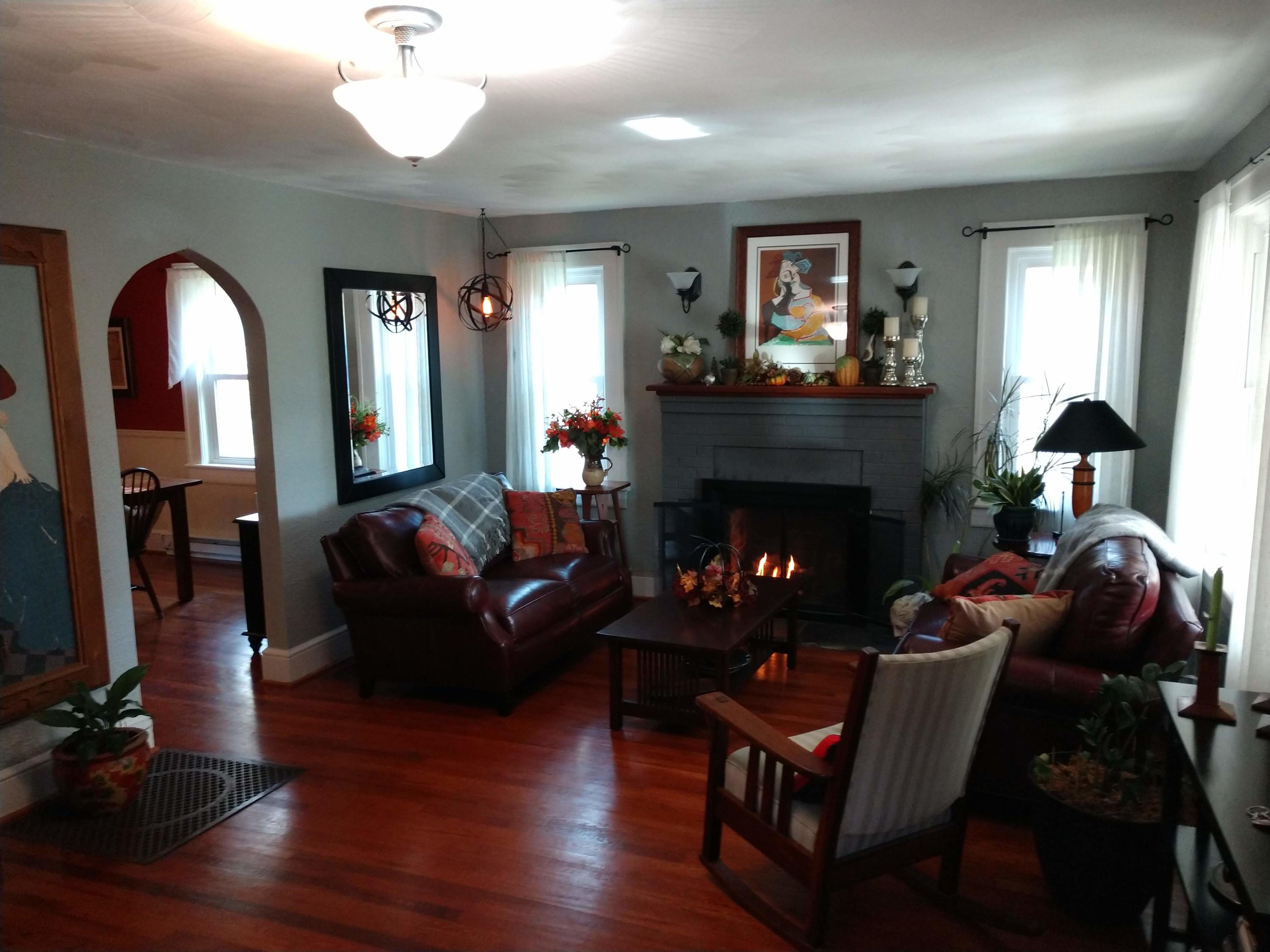 7909 Bear Ridge Road Southeast Copper Hill, VA 24079 - Photo 5 of 61 a living room with furniture and a fireplace