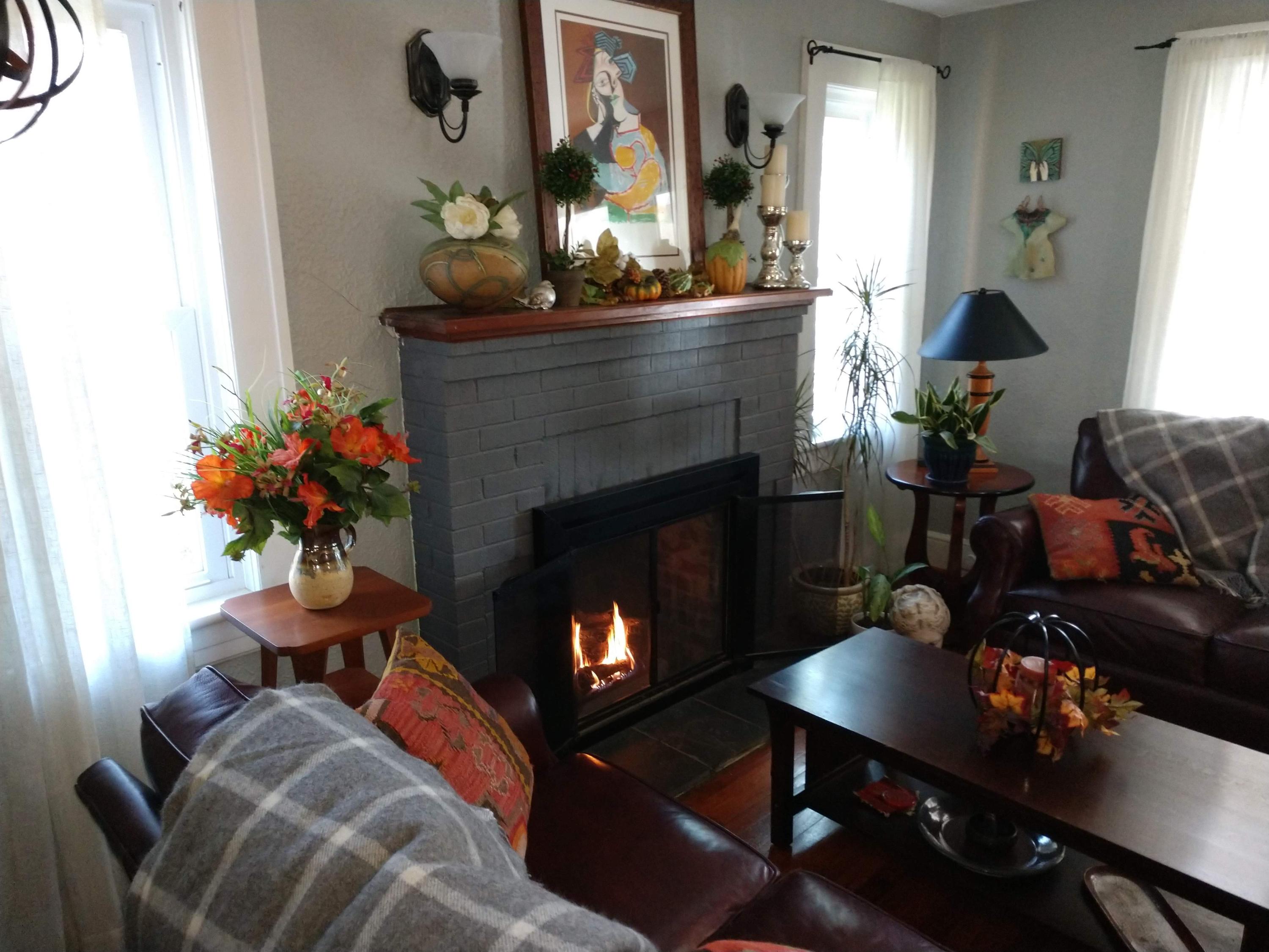 7909 Bear Ridge Road Southeast Copper Hill, VA 24079 - Photo 9 of 61 a living room with furniture and a fireplace
