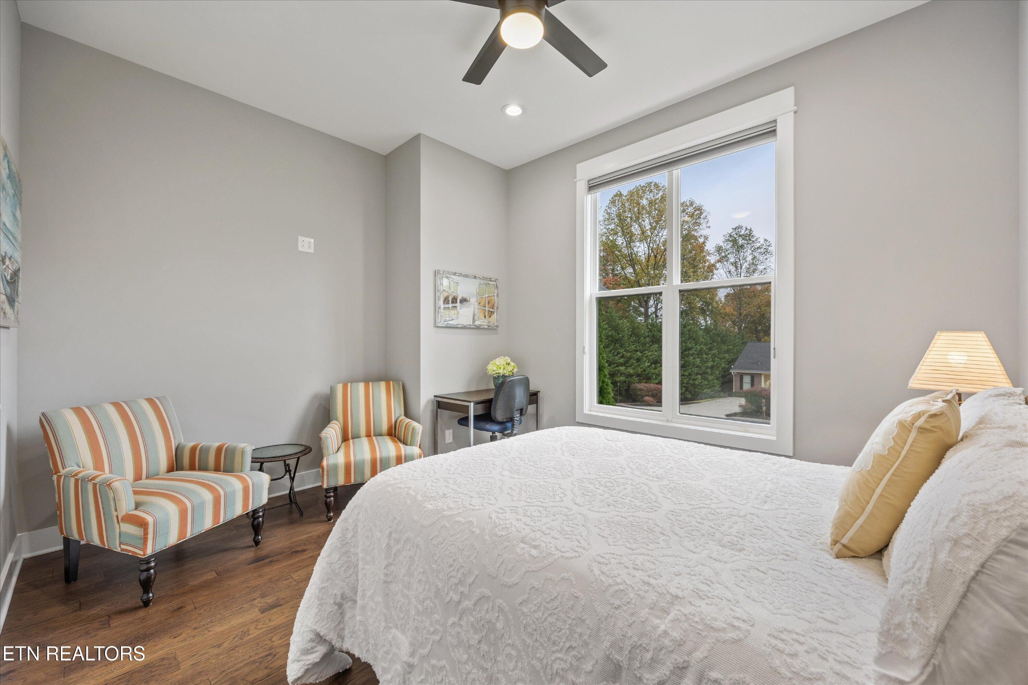 364 Mingo Way Loudon, TN 37774 - Photo 23 of 55 a spacious bedroom with a bed and a couch