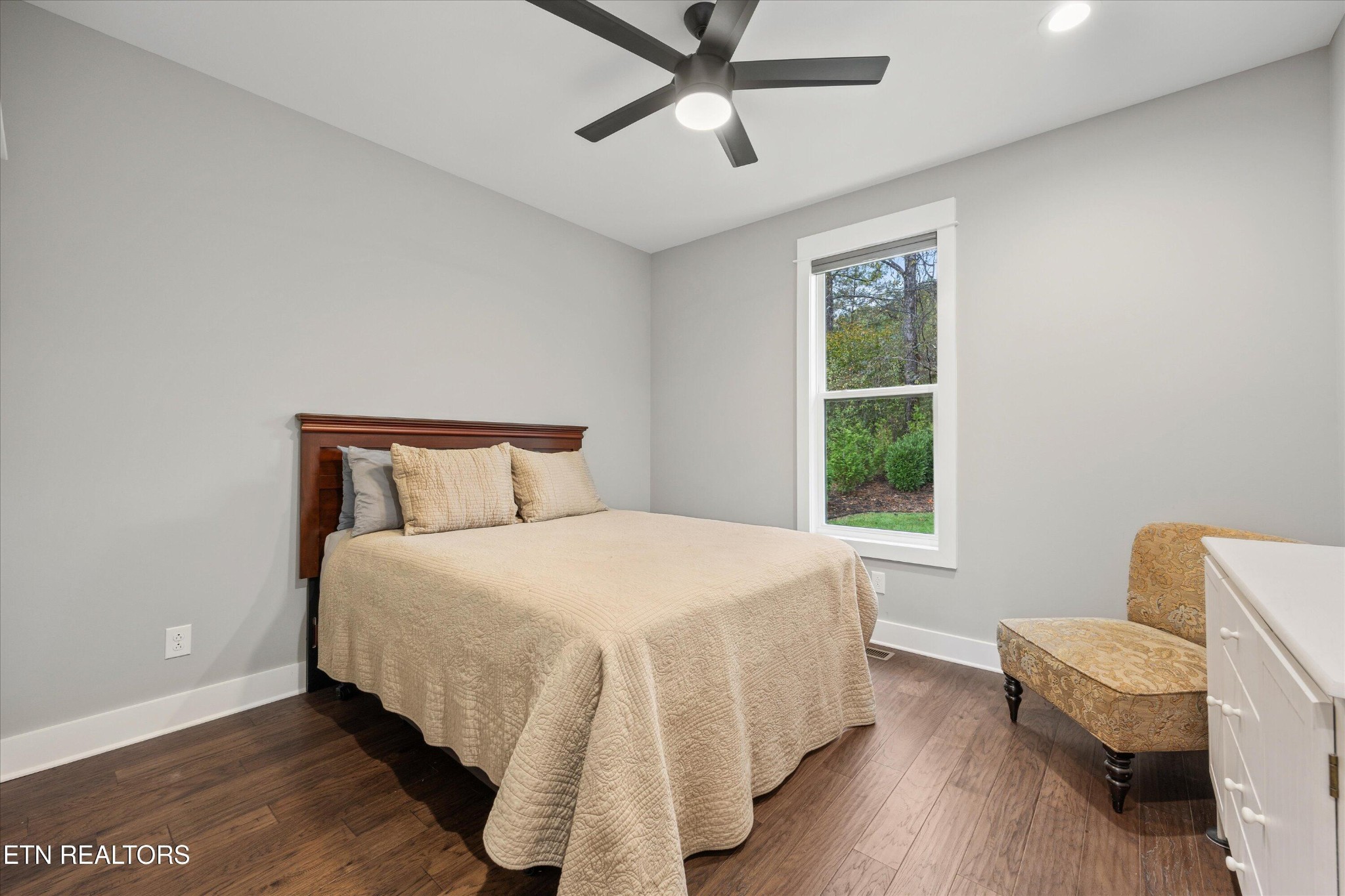 364 Mingo Way Loudon, TN 37774 - Photo 24 of 55 a bedroom with a bed and wooden floor