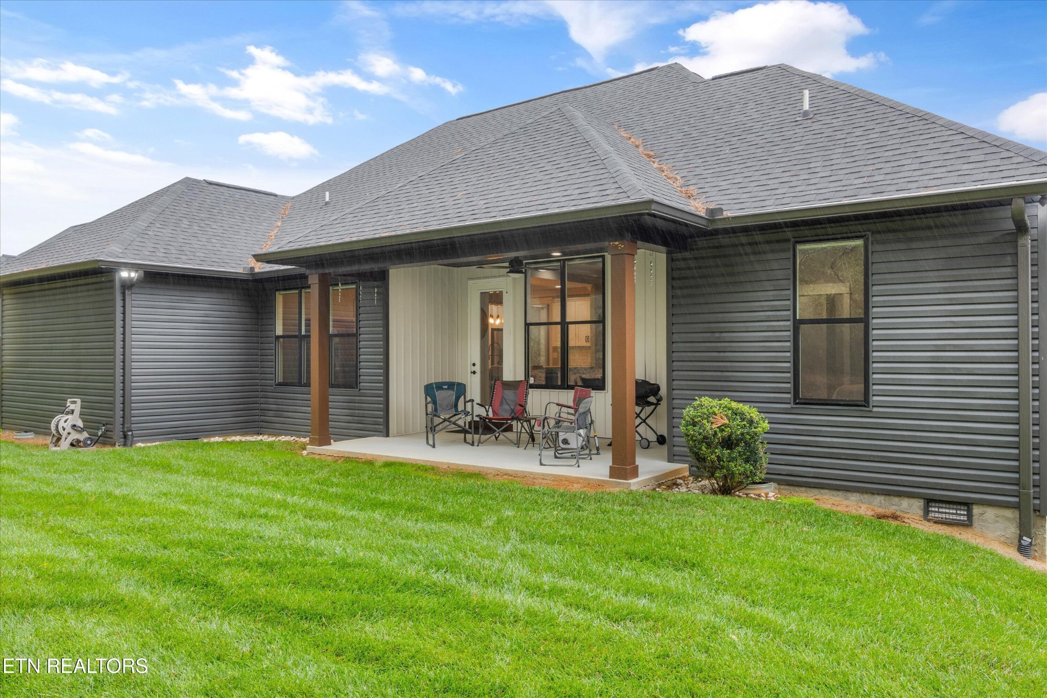364 Mingo Way Loudon, TN 37774 - Photo 33 of 55 a front view of house with yard and outdoor seating
