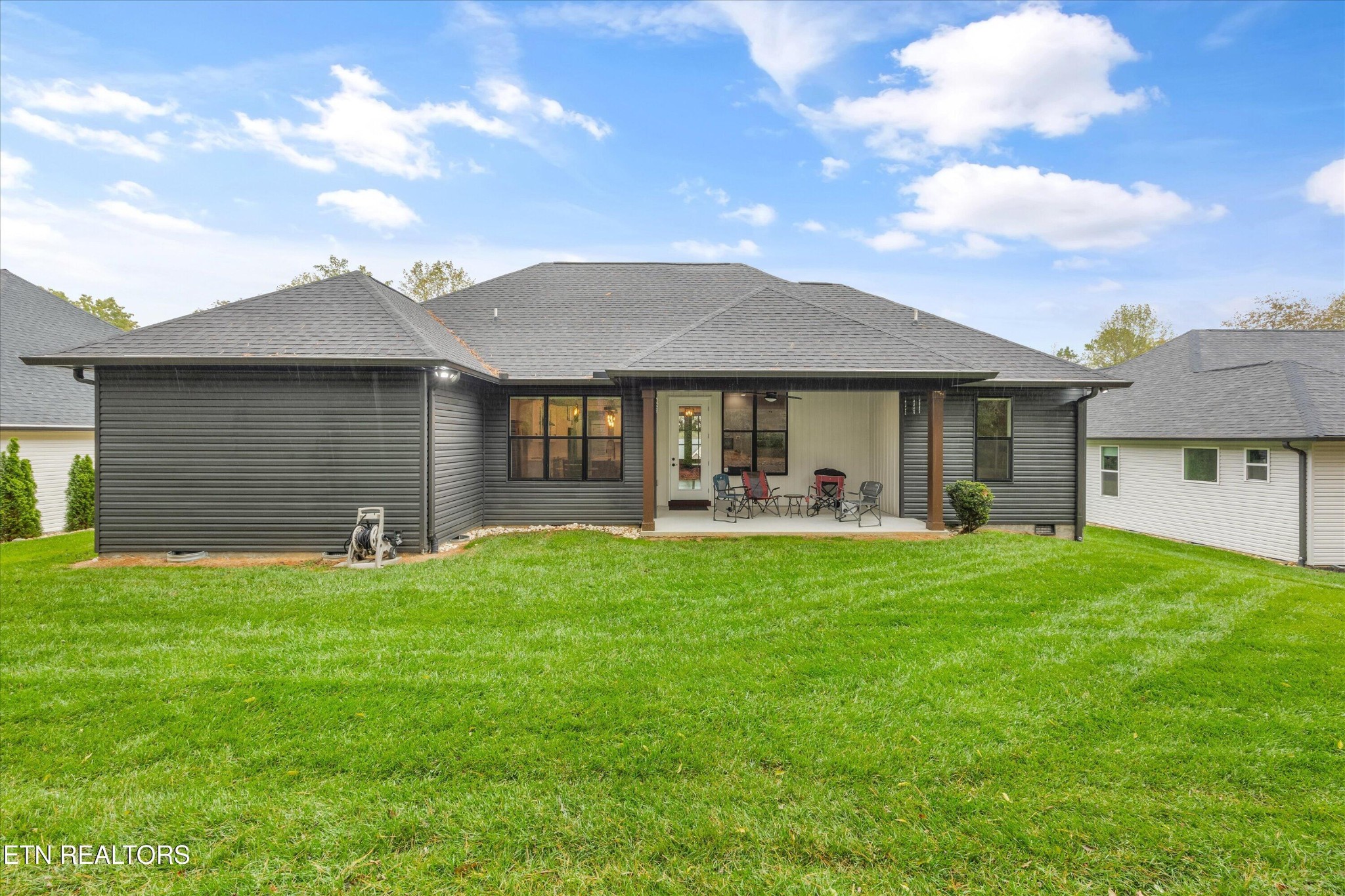 364 Mingo Way Loudon, TN 37774 - Photo 35 of 55 a front view of a house with a garden