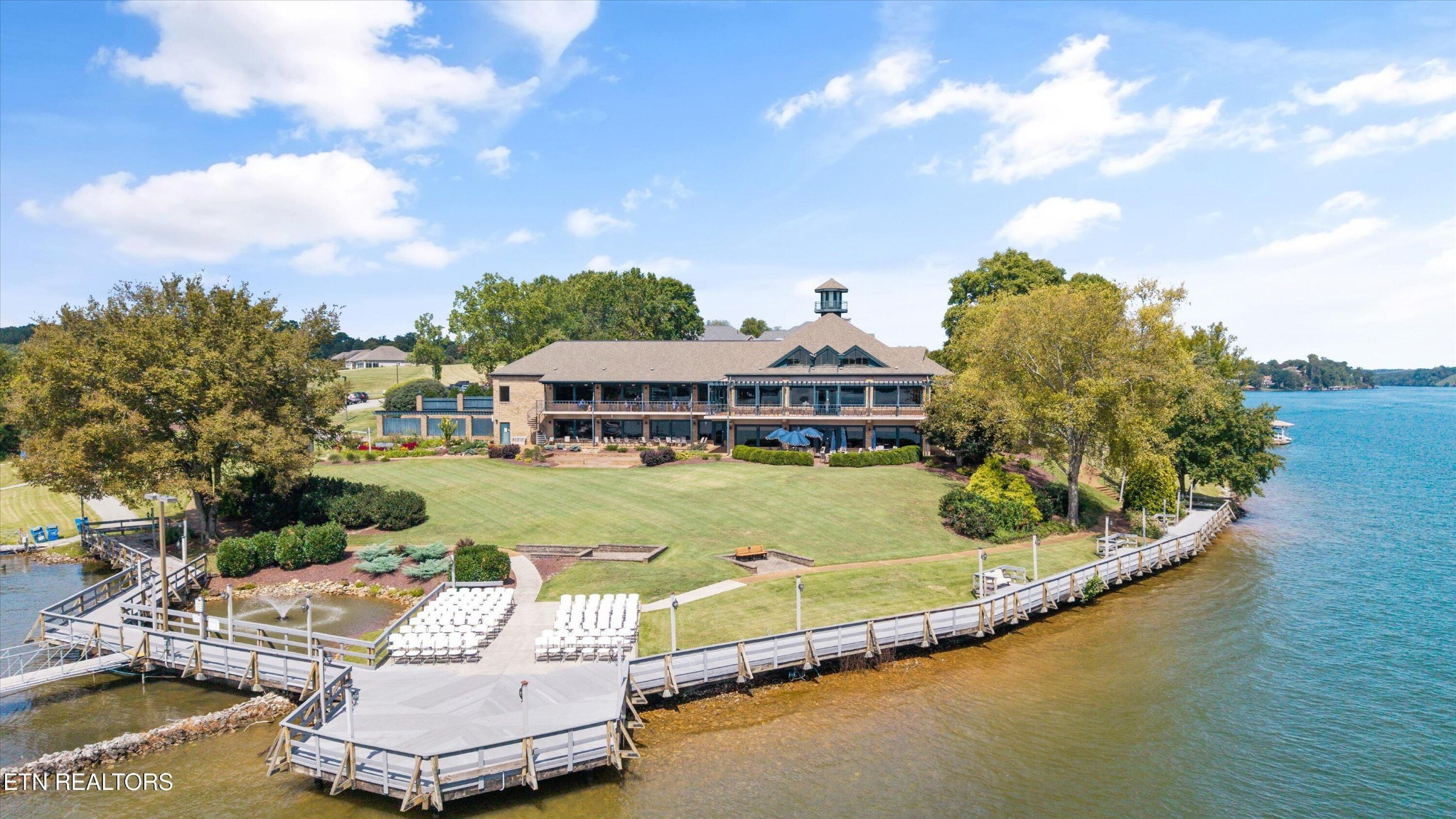 364 Mingo Way Loudon, TN 37774 - Photo 48 of 55 an aerial view of a house with swimming pool patio and lake view