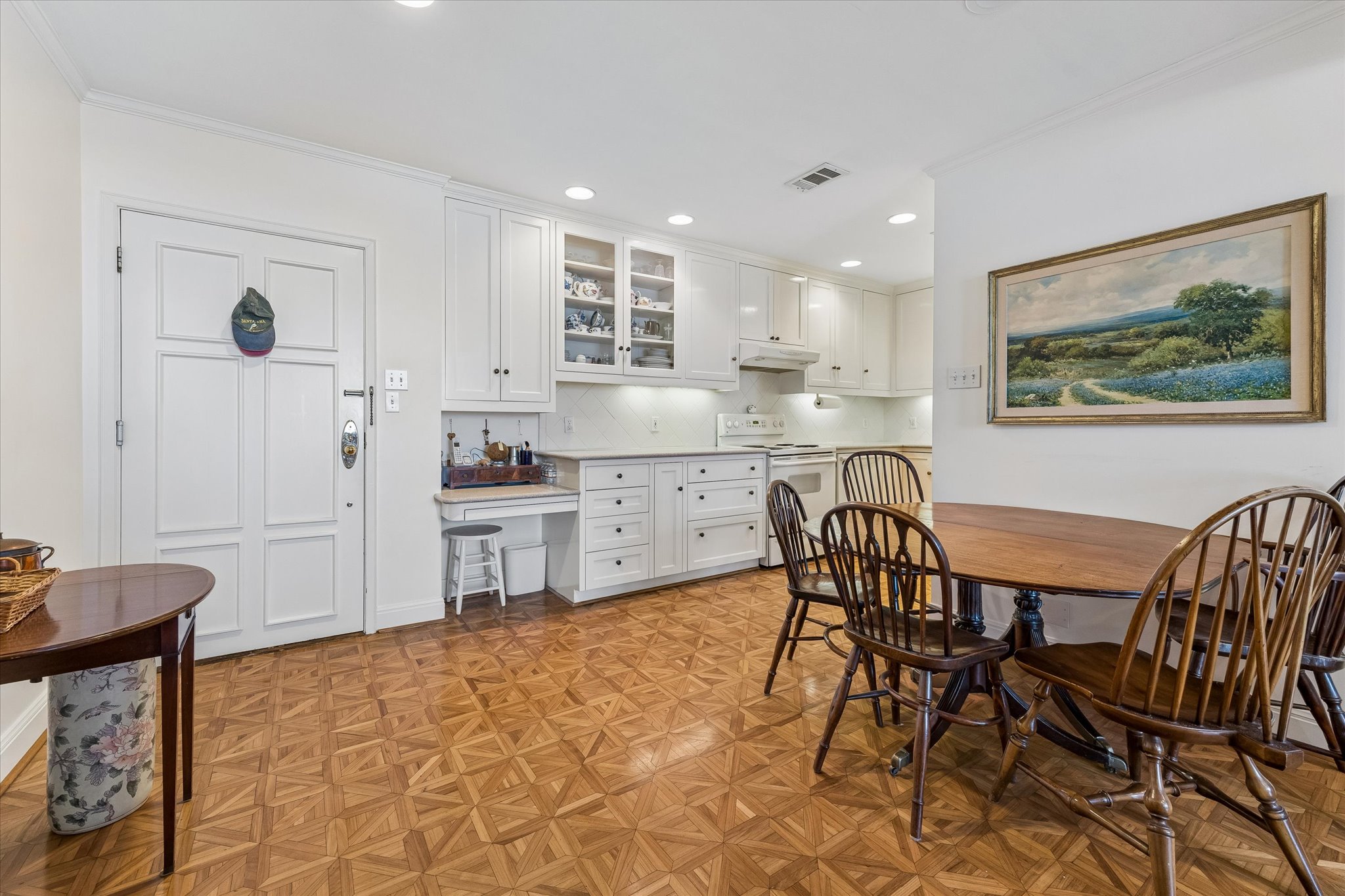 1801 Lavaca Street, Unit 6E Austin, TX 78701 - Photo 8 of 32 Dining room with ornamental molding, parquet flooring, and recessed lighting