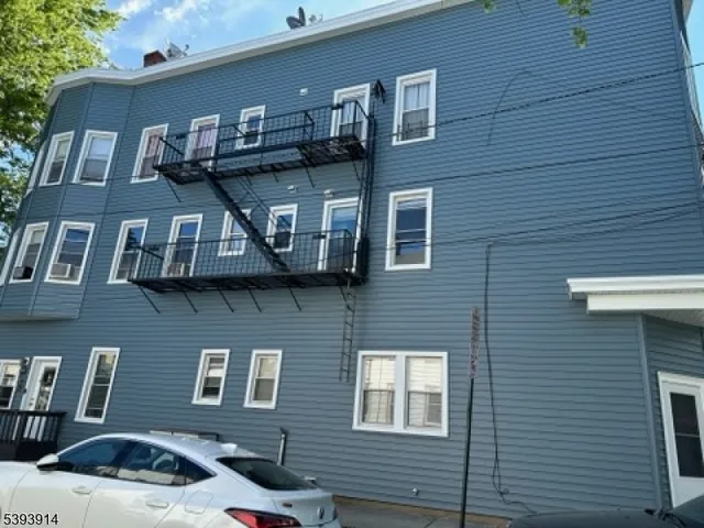 a front view of a house with balcony