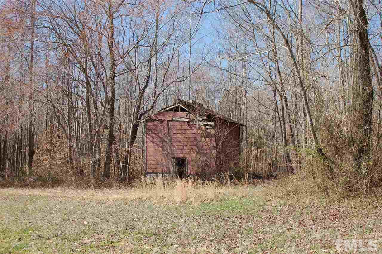 820 Billy Hicks Road Roxboro, NC 27574 - Photo 17 of 27 a view of a backyard of the house