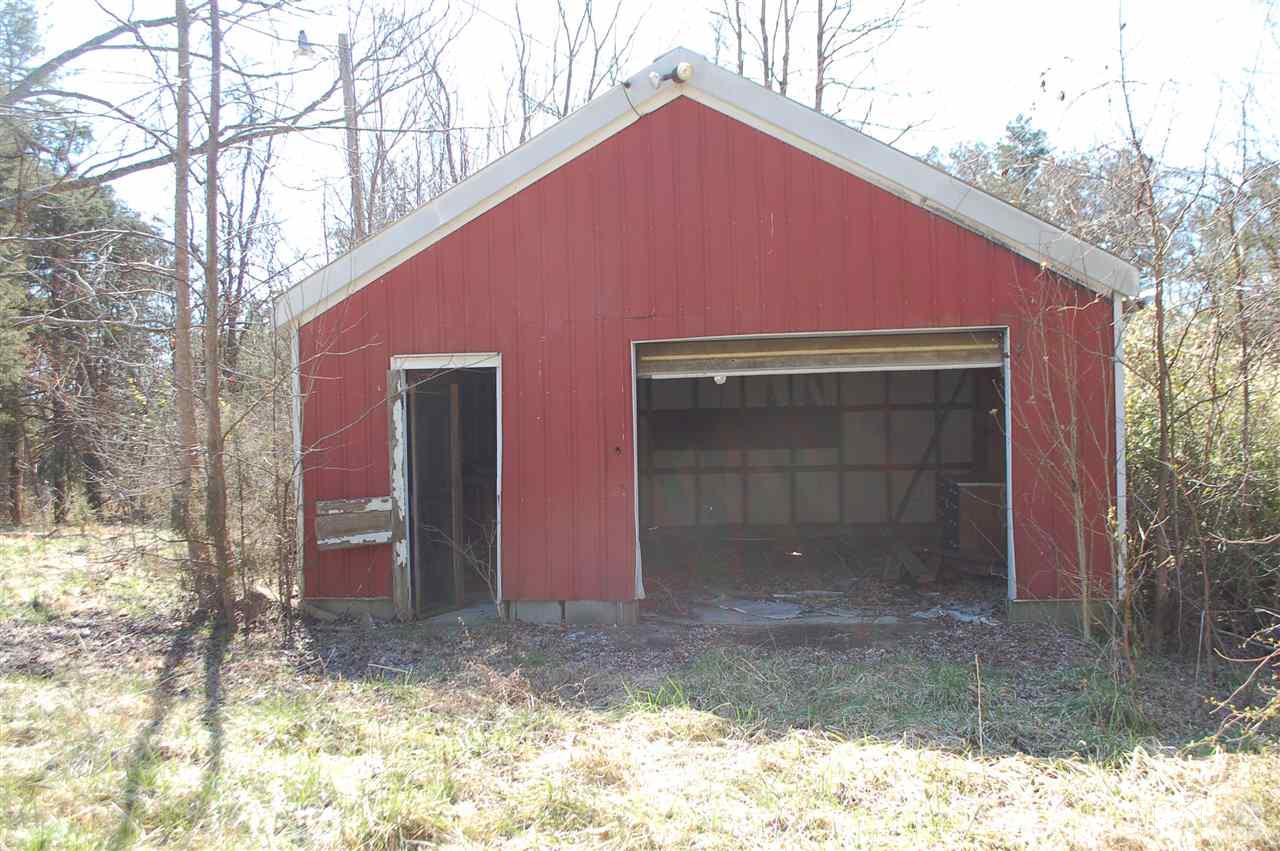 820 Billy Hicks Road Roxboro, NC 27574 - Photo 20 of 27 a front view of a house with a yard