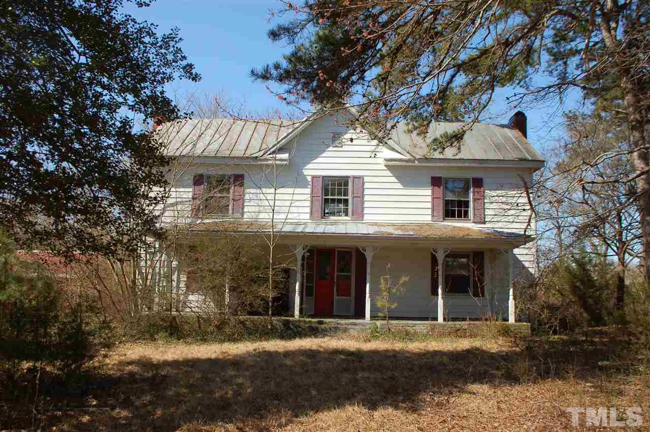 820 Billy Hicks Road Roxboro, NC 27574 - Photo 3 of 27 a front view of a house with a yard