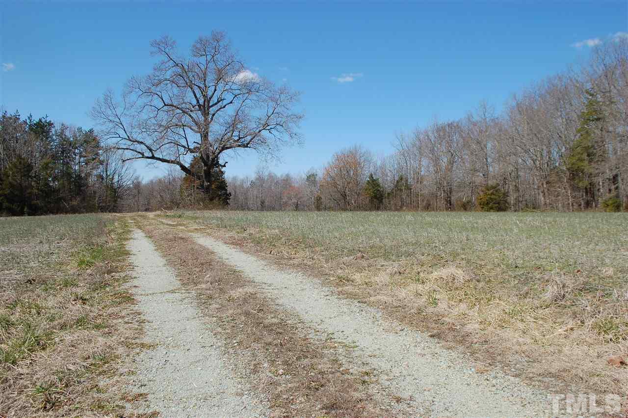 820 Billy Hicks Road Roxboro, NC 27574 - Photo 24 of 27 a view of a field with trees