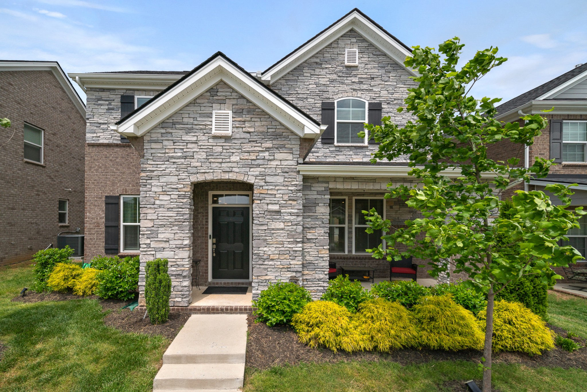 3725 Hoggett Ford Road Hermitage, TN 37076 - Photo 1 of 22 a front view of a house with a garden