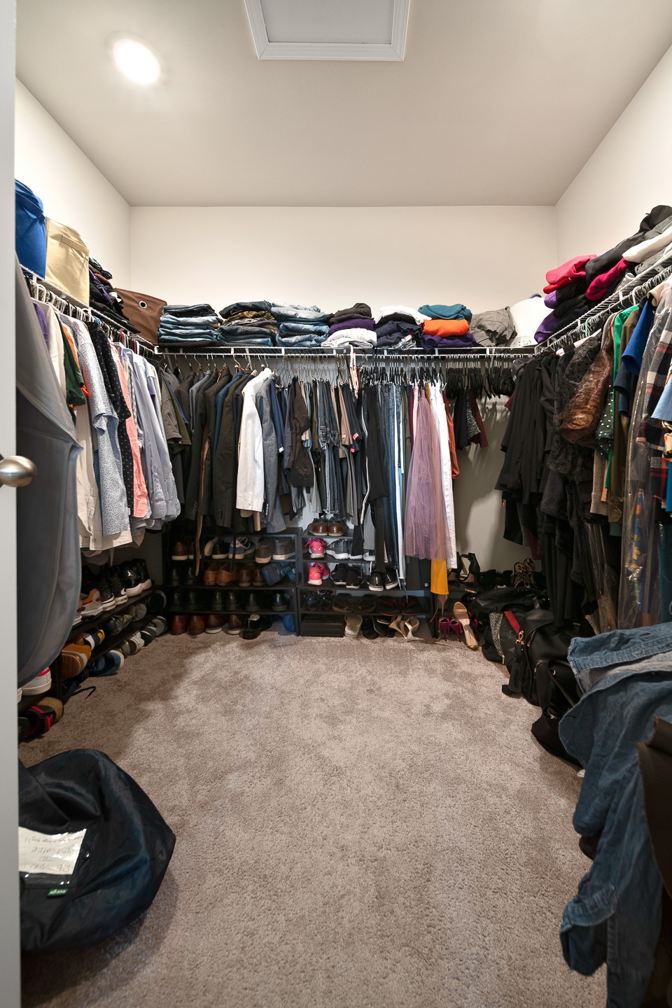 3725 Hoggett Ford Road Hermitage, TN 37076 - Photo 15 of 22 a view of walk in closet with clothes and shoes