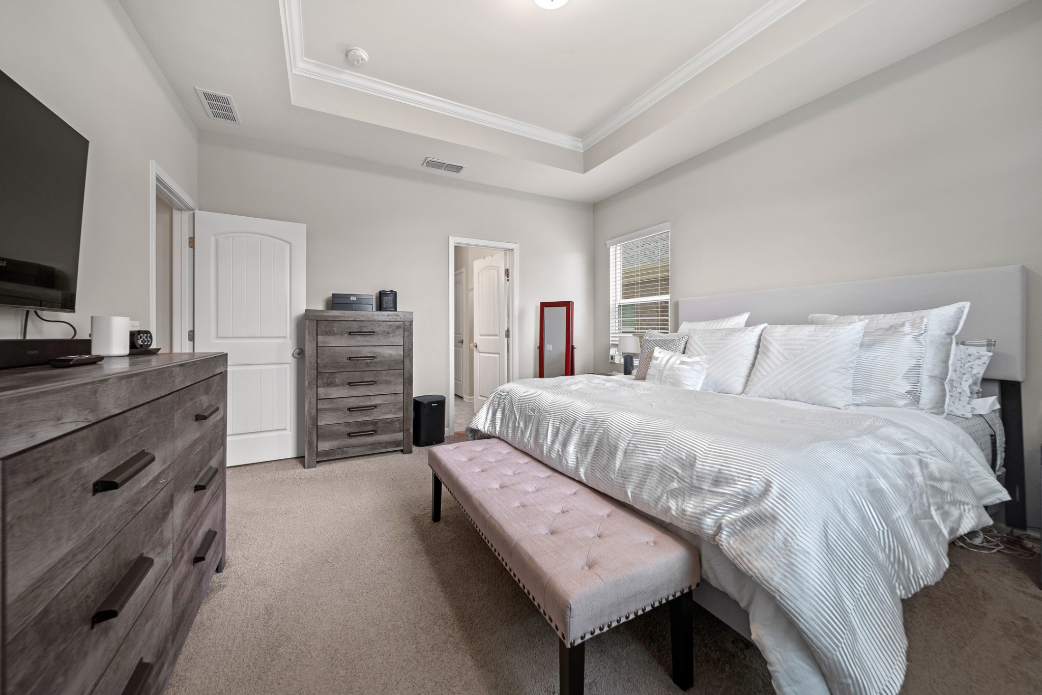 3725 Hoggett Ford Road Hermitage, TN 37076 - Photo 16 of 22 a bedroom with a bed and flat screen tv