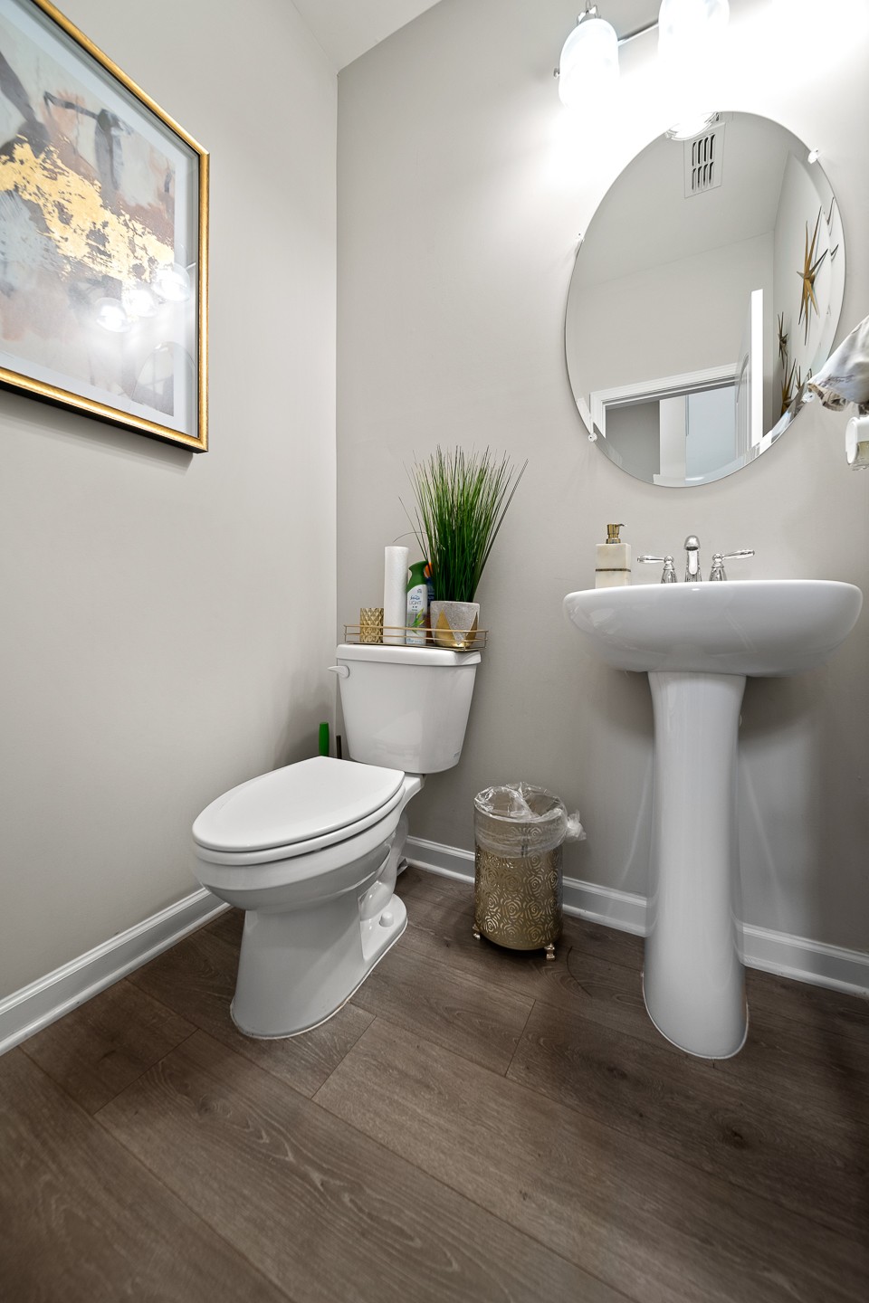 3725 Hoggett Ford Road Hermitage, TN 37076 - Photo 10 of 22 a white toilet sitting next to a bathroom sink