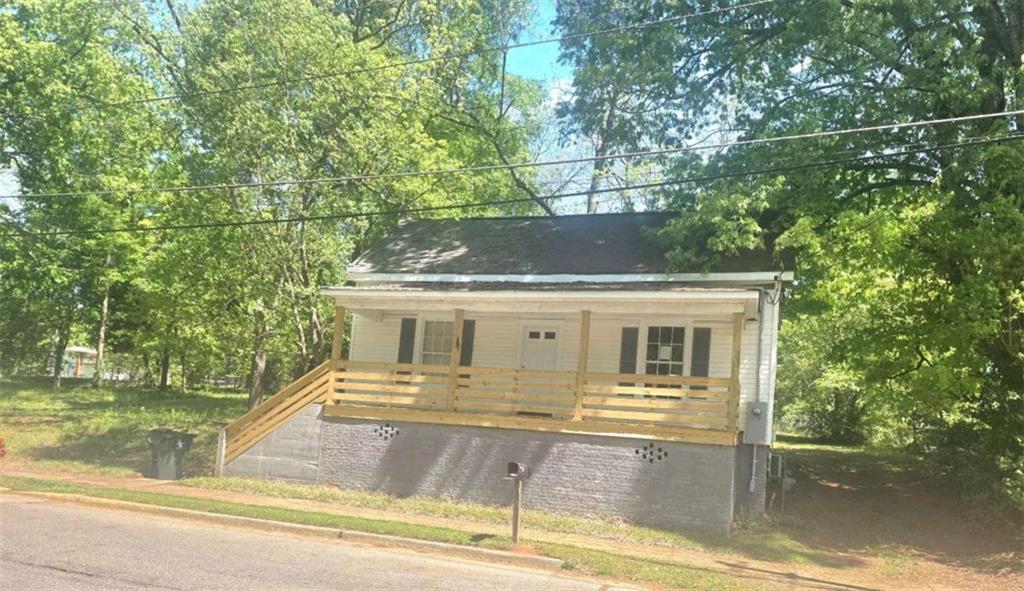 108 G Avenue Thomaston, GA 30286 - Photo 1 of 19 a view of a house with a yard