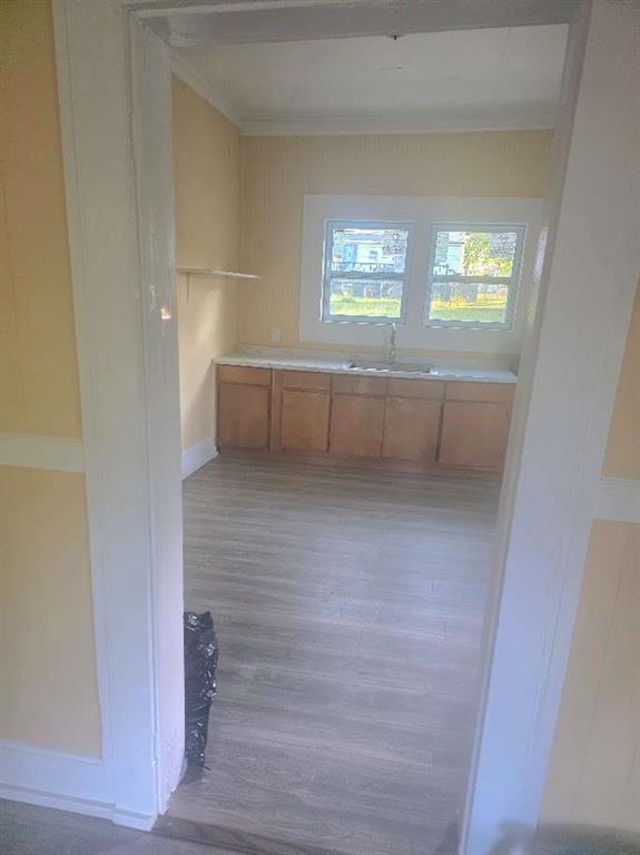 108 G Avenue Thomaston, GA 30286 - Photo 3 of 19 a view of empty room with windows and wardrobe