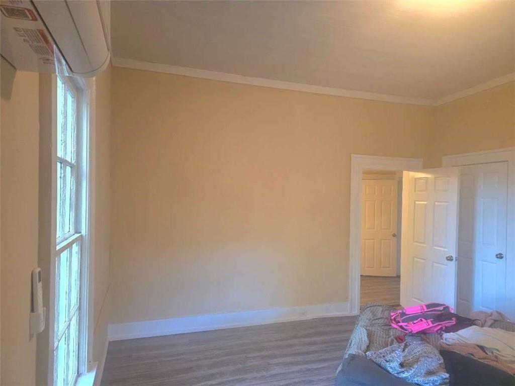 108 G Avenue Thomaston, GA 30286 - Photo 10 of 19 a room with a window and couch