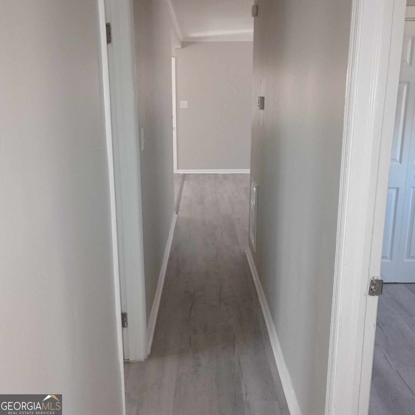 193 Frazier Drive Southeast Milledgeville, GA 31061 - Photo 31 of 38 a view of a hallway with wooden floor