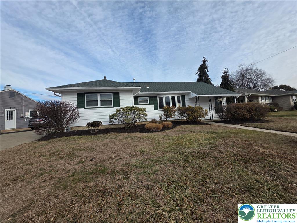 1958 Aripine Avenue Bethlehem, PA 18018 - Photo 1 of 30 a front view of a house with garden