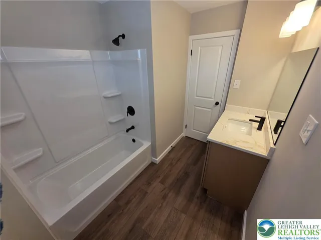 a bathroom with a bathtub