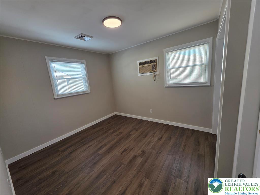 1958 Aripine Avenue Bethlehem, PA 18018 - Photo 20 of 30 a view of an empty room with wooden floor and a window