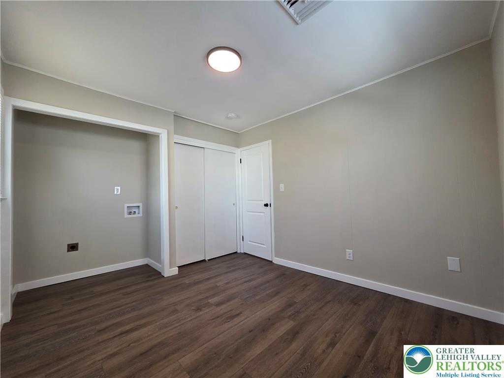 1958 Aripine Avenue Bethlehem, PA 18018 - Photo 22 of 30 a view of an empty room with wooden floor