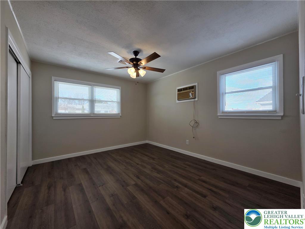 1958 Aripine Avenue Bethlehem, PA 18018 - Photo 23 of 30 a view of an empty room with a window and wooden floor