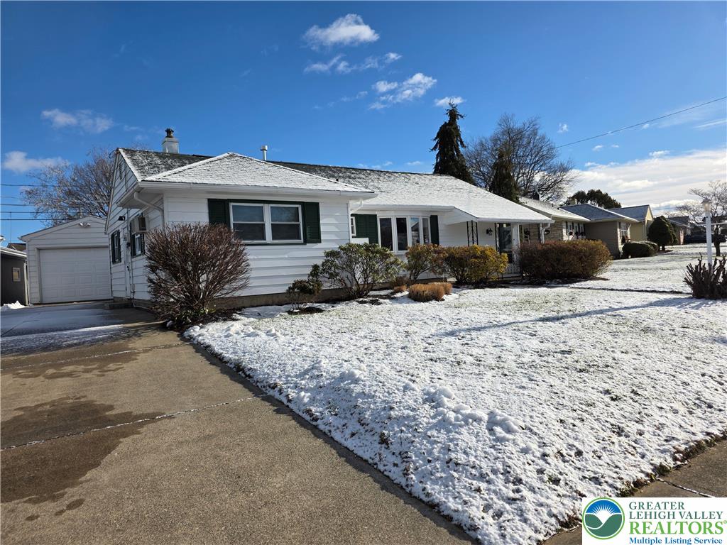 1958 Aripine Avenue Bethlehem, PA 18018 - Photo 30 of 30 a front view of a house with a yard covered in snow