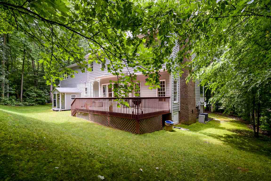 4600 Salem Ridge Road Holly Springs, NC 27540 - Photo 24 of 25 The third of an acre lot is private and secluded, but with ample lawn space to play fetch with the family dog or throw a football with friends. Back Yard