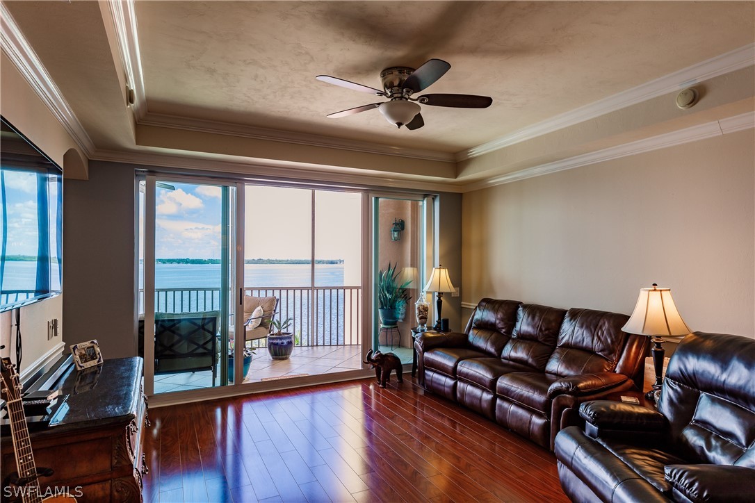 2743 First Street, Unit 704 Fort Myers, FL 33916 - Photo 6 of 17 a living room with furniture and a large window