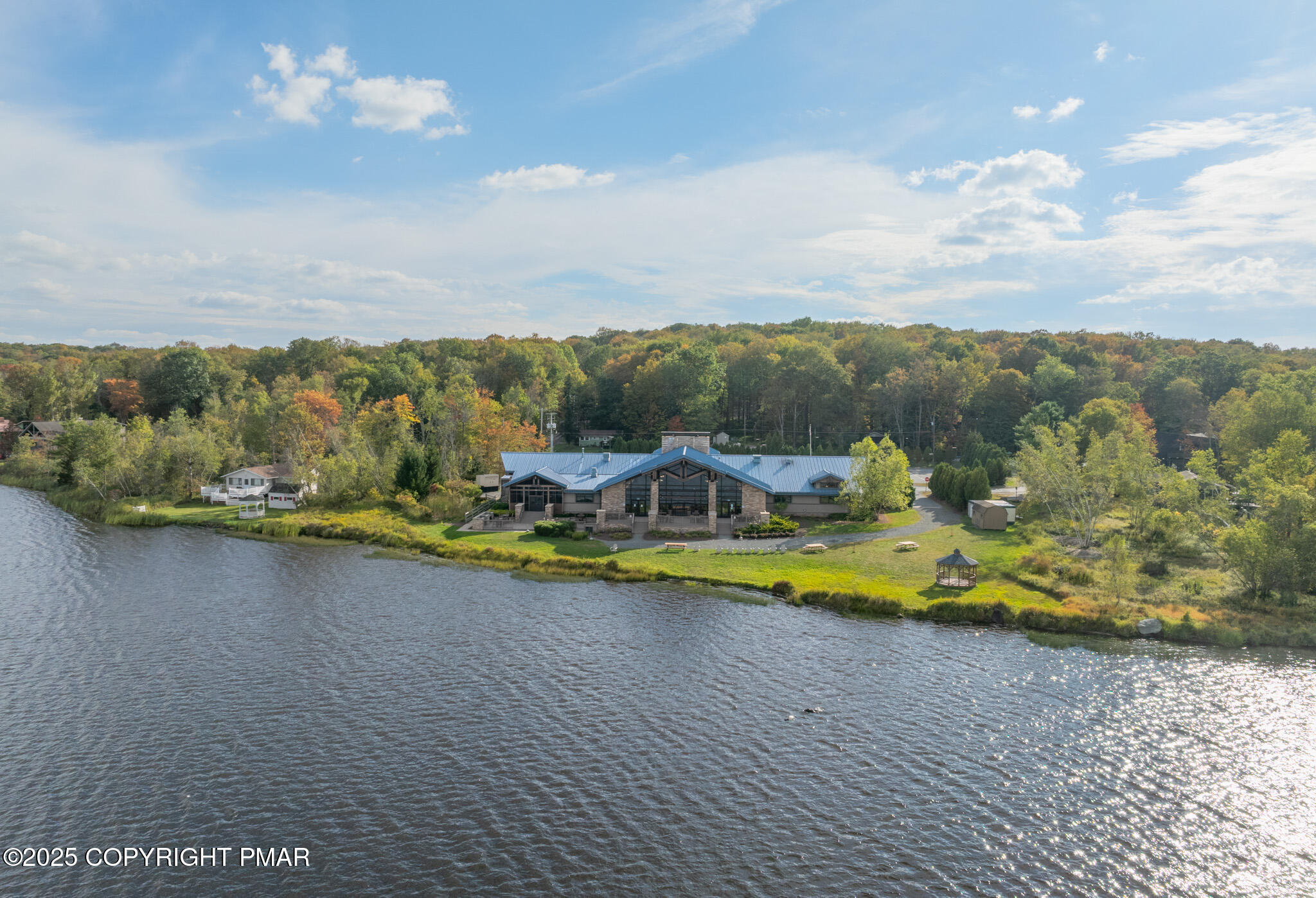3118 Ogontz Drive Pocono Lake, PA 18347 - Photo 11 of 66 a view of a swimming pool with an ocean view