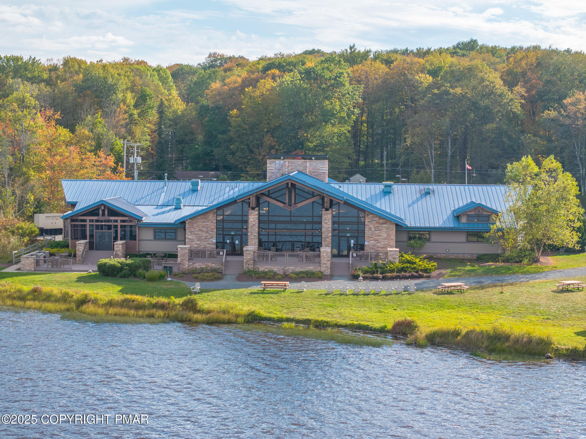 3118 Ogontz Drive Pocono Lake, PA 18347 - Photo 12 of 66 a view of a house with swimming pool and a yard