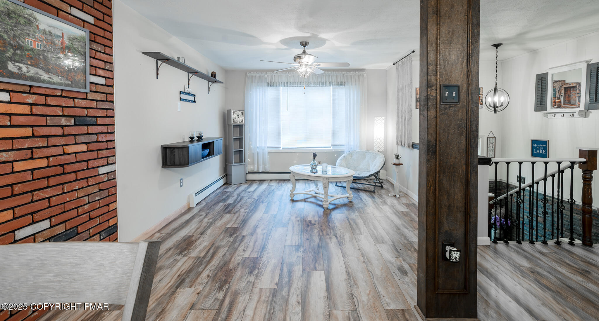 3118 Ogontz Drive Pocono Lake, PA 18347 - Photo 25 of 66 a living room with furniture and a wooden floor