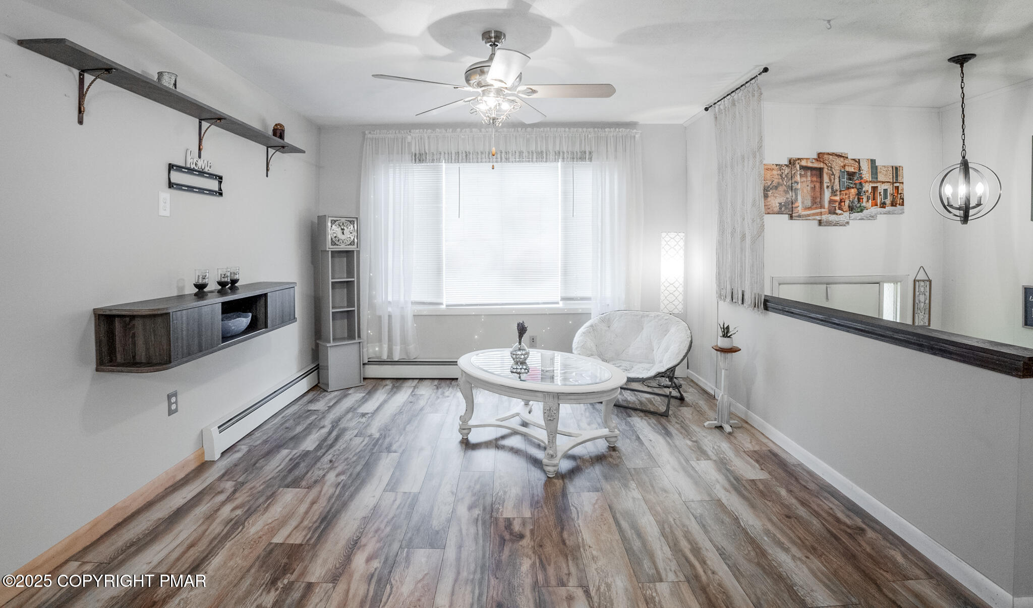 3118 Ogontz Drive Pocono Lake, PA 18347 - Photo 27 of 66 a living room with furniture and a table