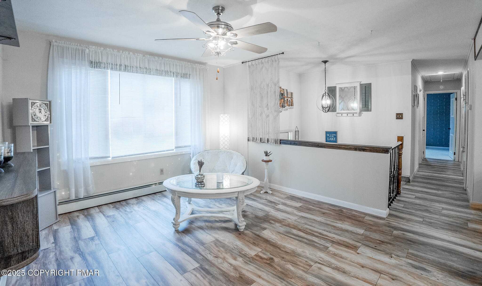 3118 Ogontz Drive Pocono Lake, PA 18347 - Photo 29 of 66 a living room with furniture and a wooden floor