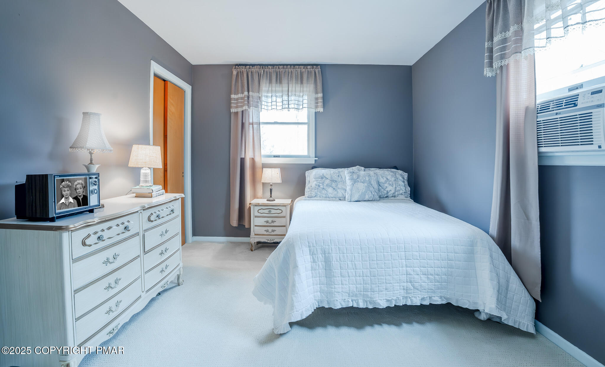 3118 Ogontz Drive Pocono Lake, PA 18347 - Photo 42 of 66 a bedroom with a bed and window