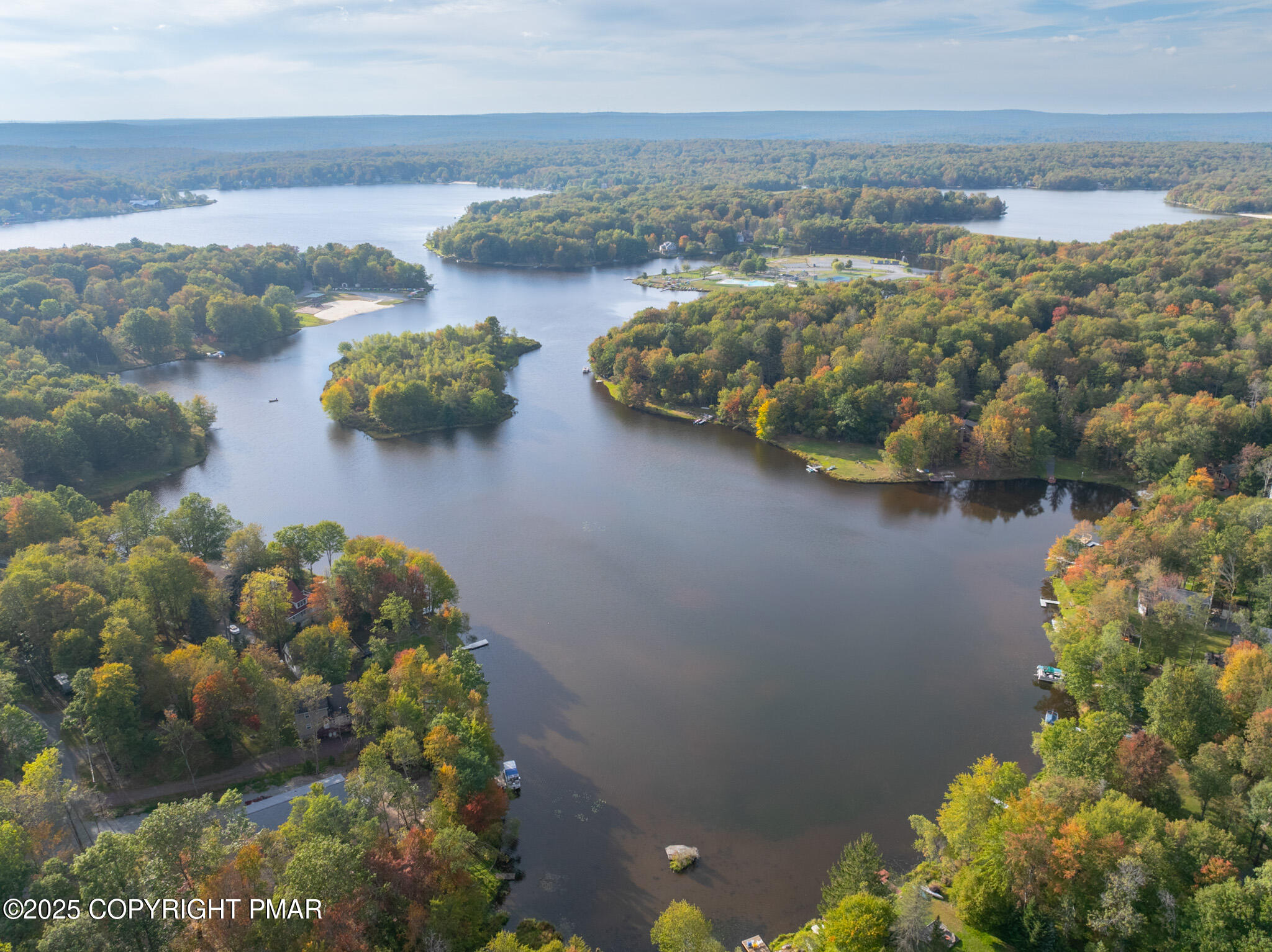 3118 Ogontz Drive Pocono Lake, PA 18347 - Photo 8 of 66 a view of a lake with a mountain in the background