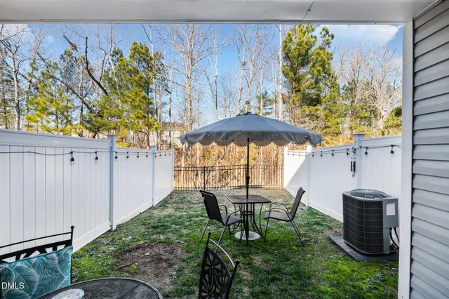 a garden view with a seating space