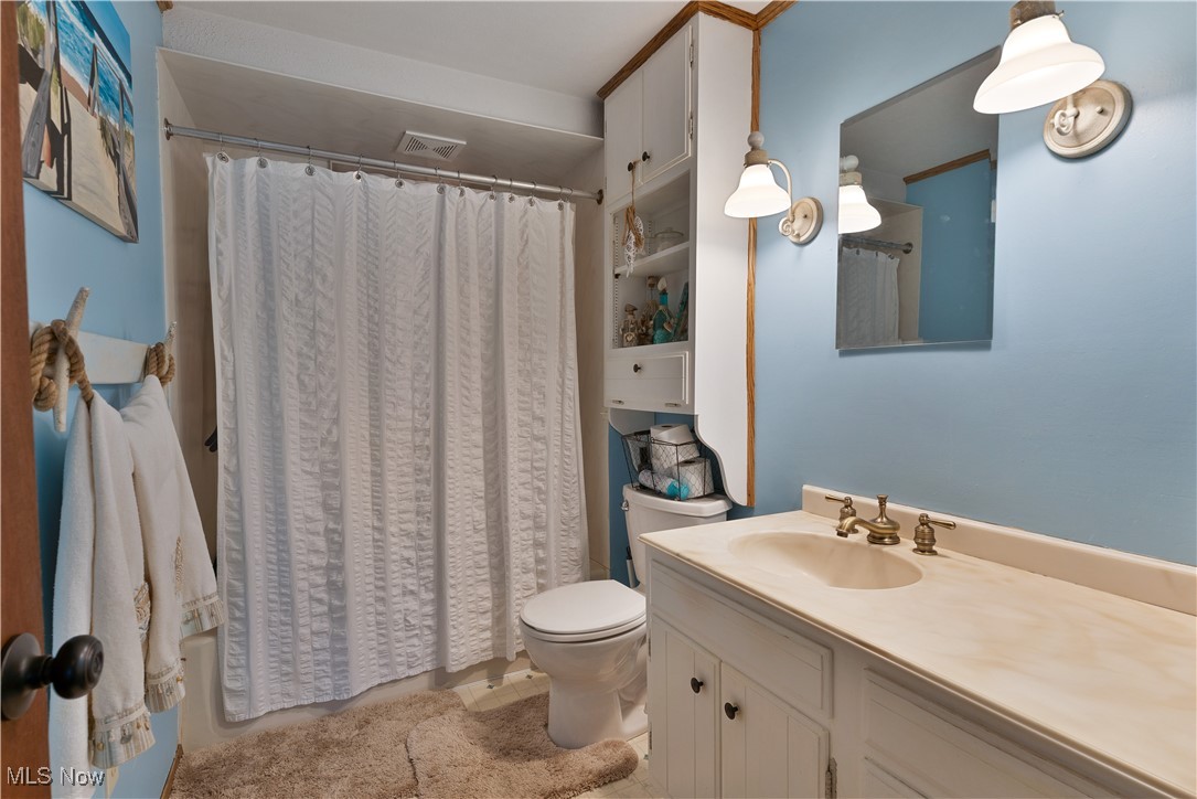 6370 Fairview Road Youngstown, OH 44515 - Photo 18 of 38 Full bath with vanity and toilet