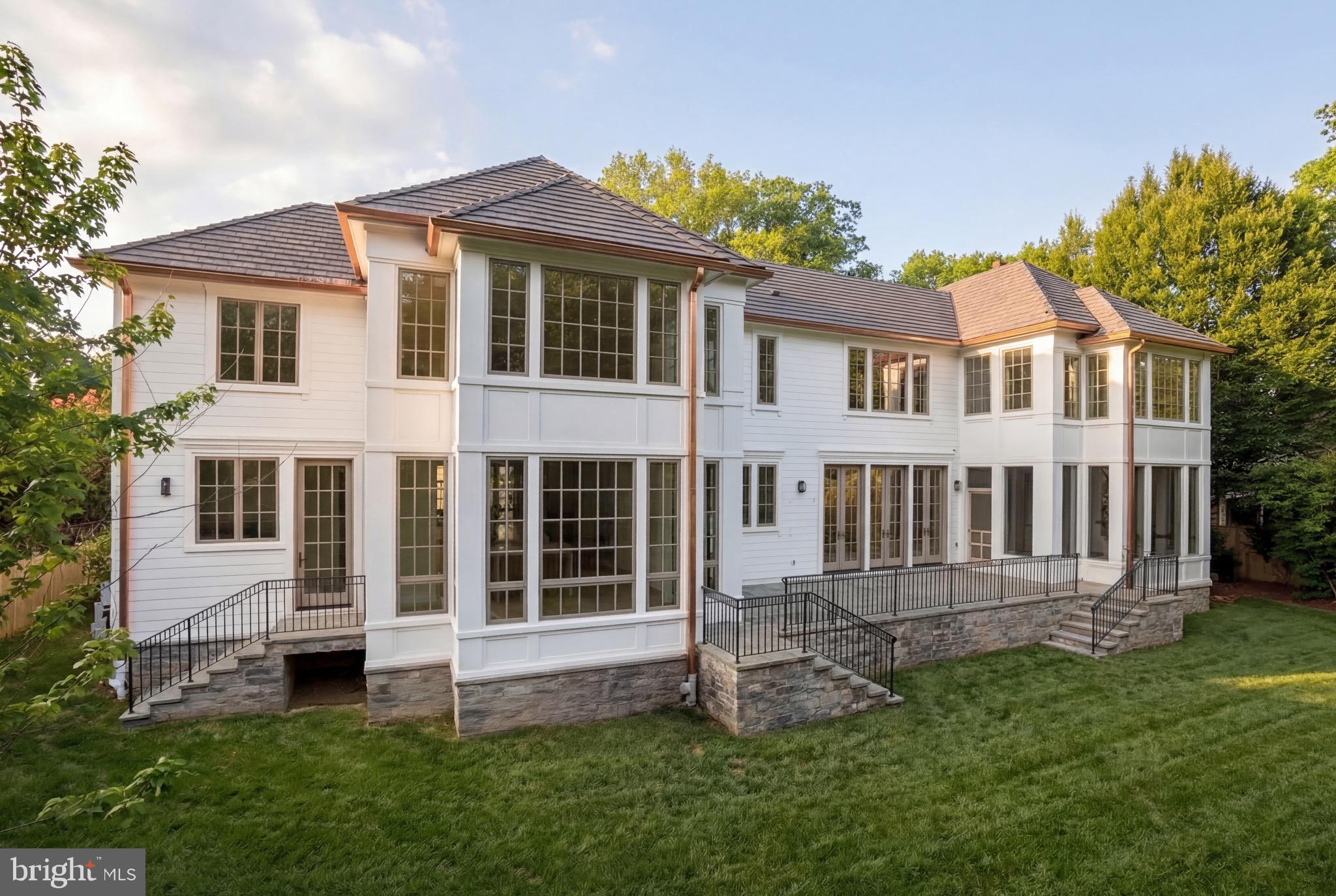 5042 Overlook Road Northwest Washington, DC 20016 - Photo 14 of 15 Stunning Rear Elevation with Patio and Lawn