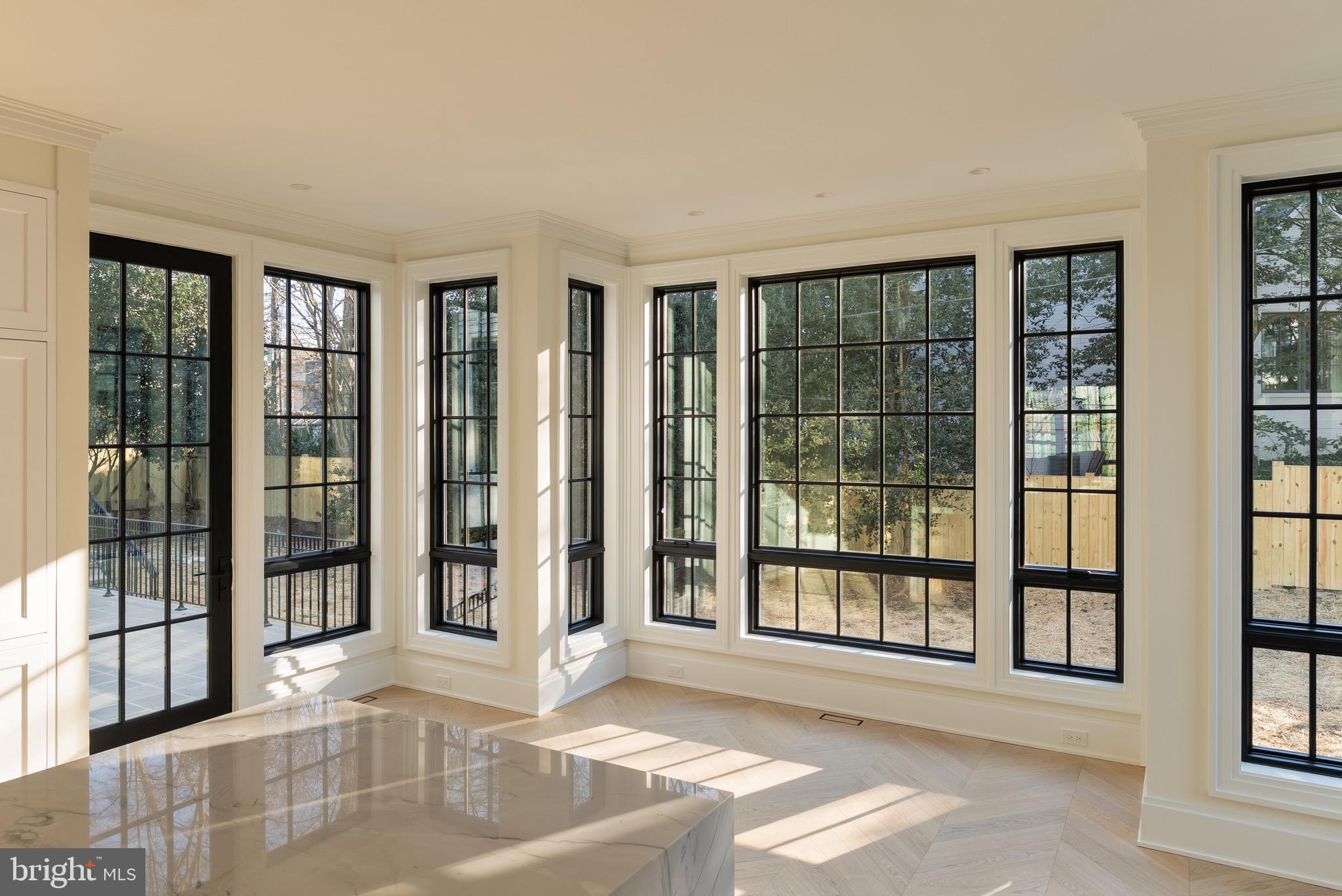 5042 Overlook Road Northwest Washington, DC 20016 - Photo 7 of 15 Floor to Ceiling Windows Throughout