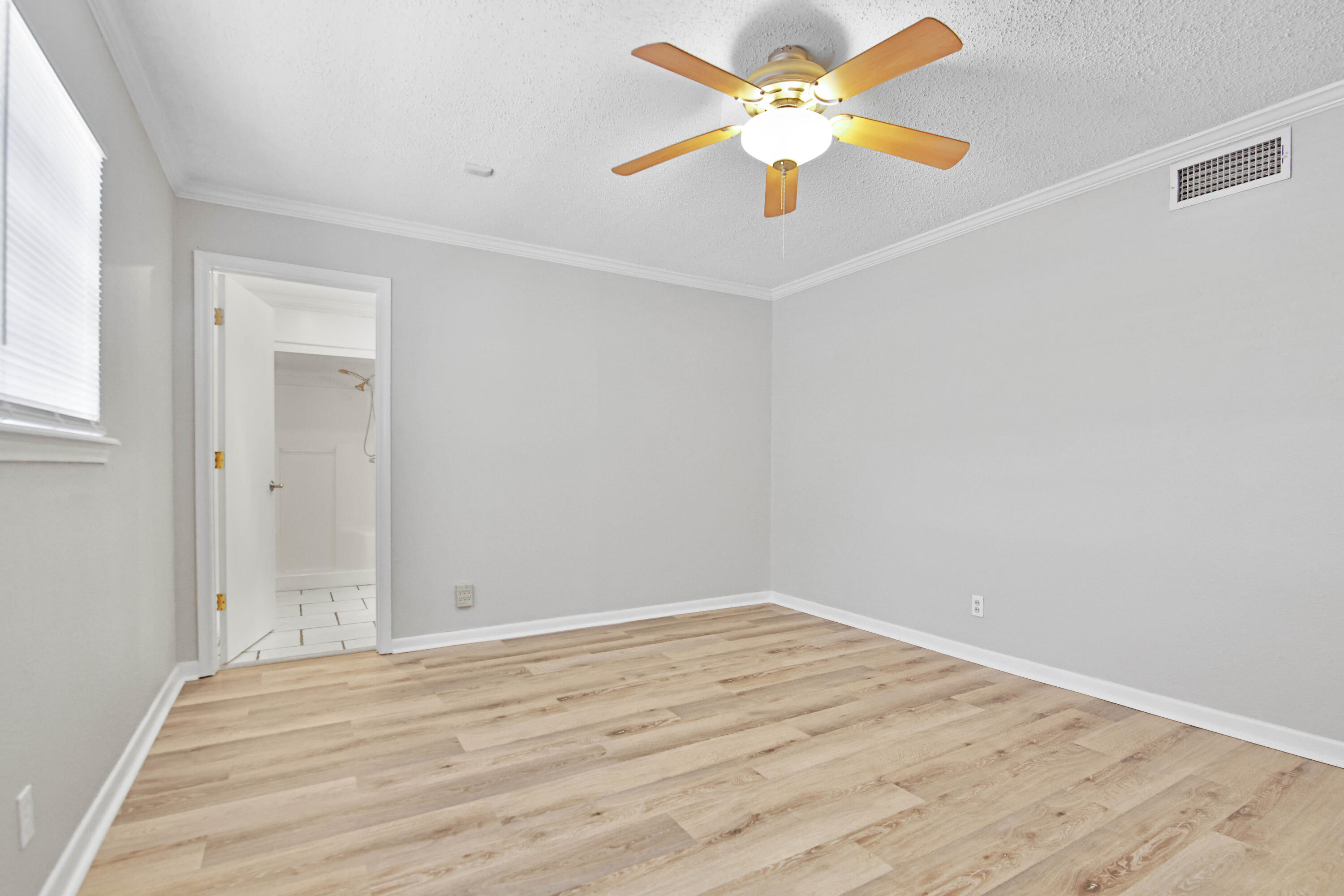 4310 42nd Street Lubbock, TX 79413 - Photo 12 of 30 wooden floor in an empty room
