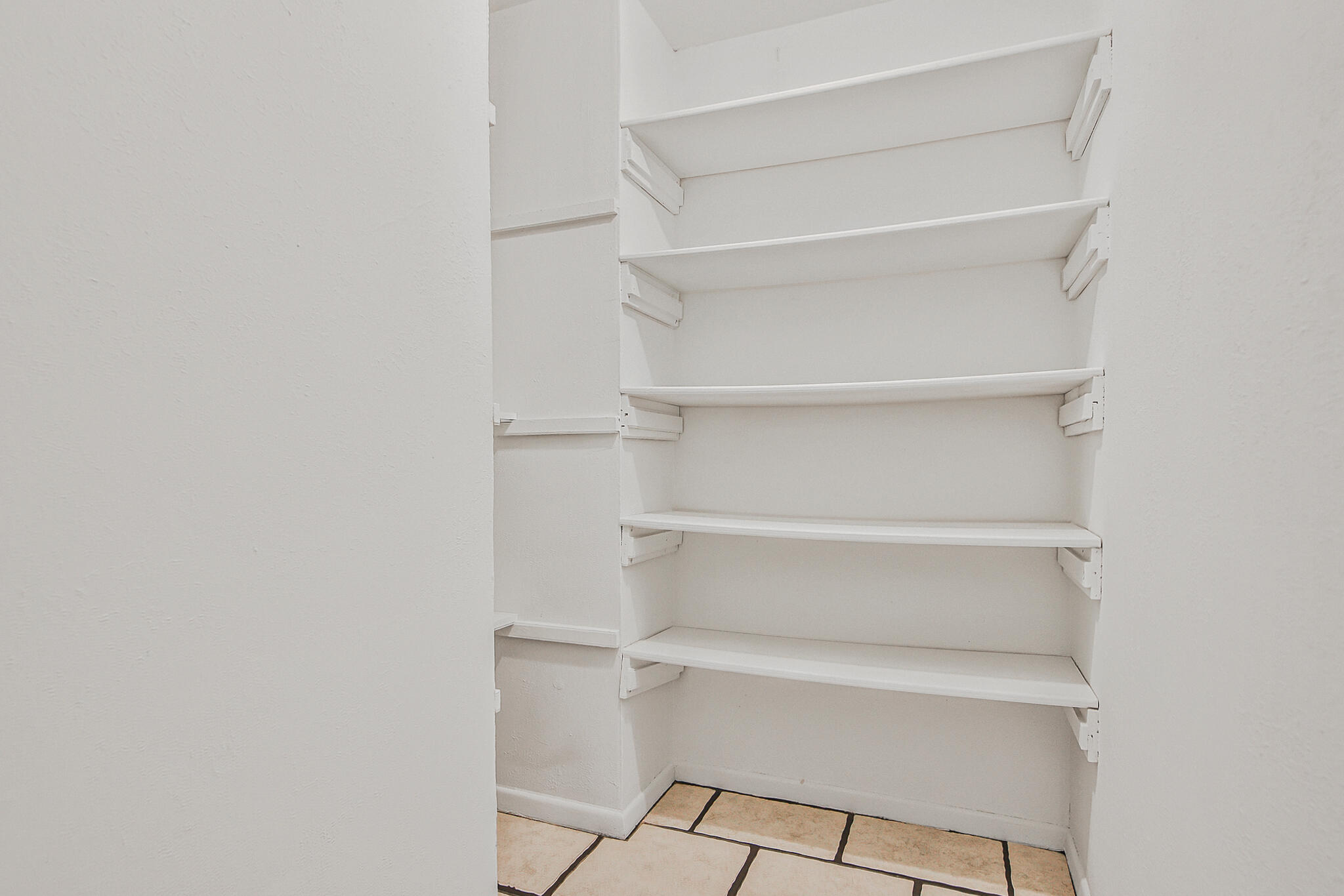 4310 42nd Street Lubbock, TX 79413 - Photo 30 of 30 a view of an empty walk in closet