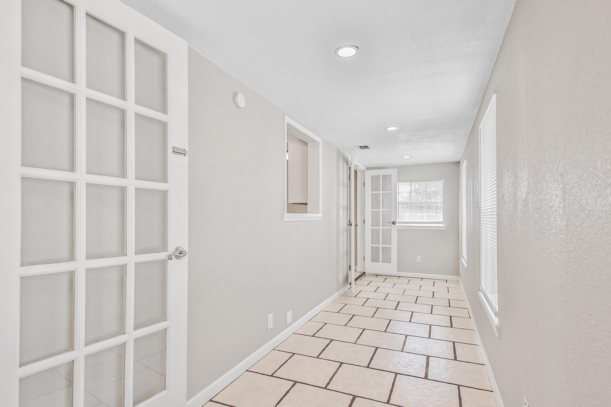 4310 42nd Street Lubbock, TX 79413 - Photo 10 of 30 a view of an empty room with window