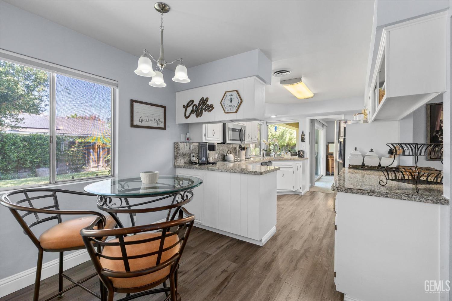 Undisclosed Address Bakersfield, CA 93309 - Photo 17 of 34 a view of a dining room kitchen and windows