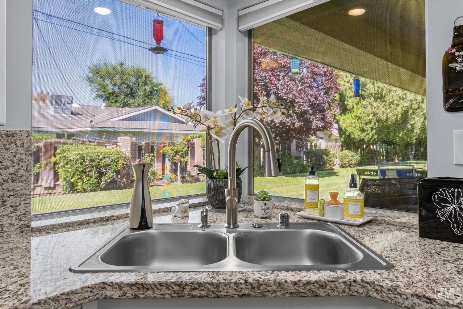 Undisclosed Address Bakersfield, CA 93309 - Photo 20 of 34 a kitchen with a sink and a large window