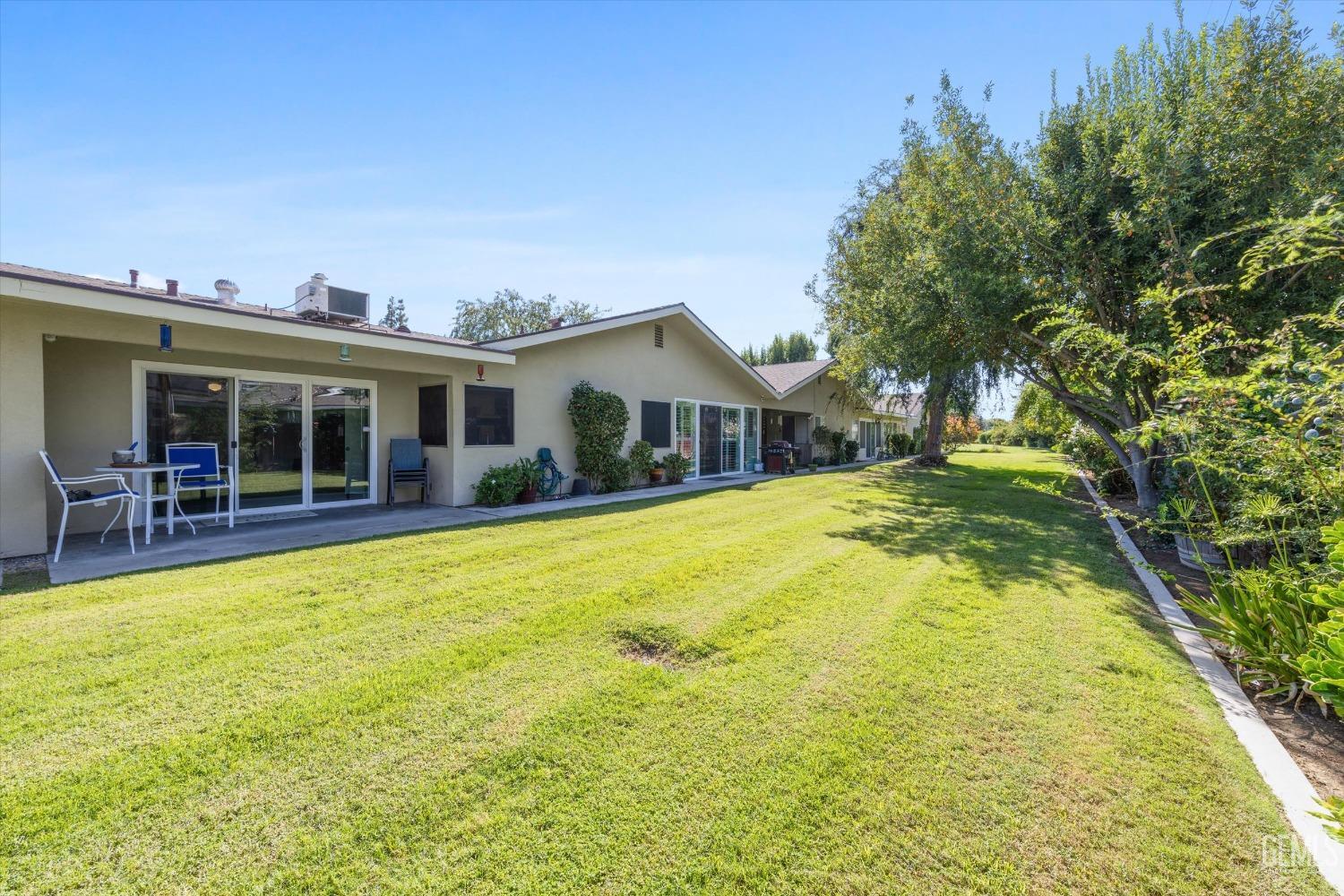 Undisclosed Address Bakersfield, CA 93309 - Photo 32 of 34 a view of an house with swimming pool and porch