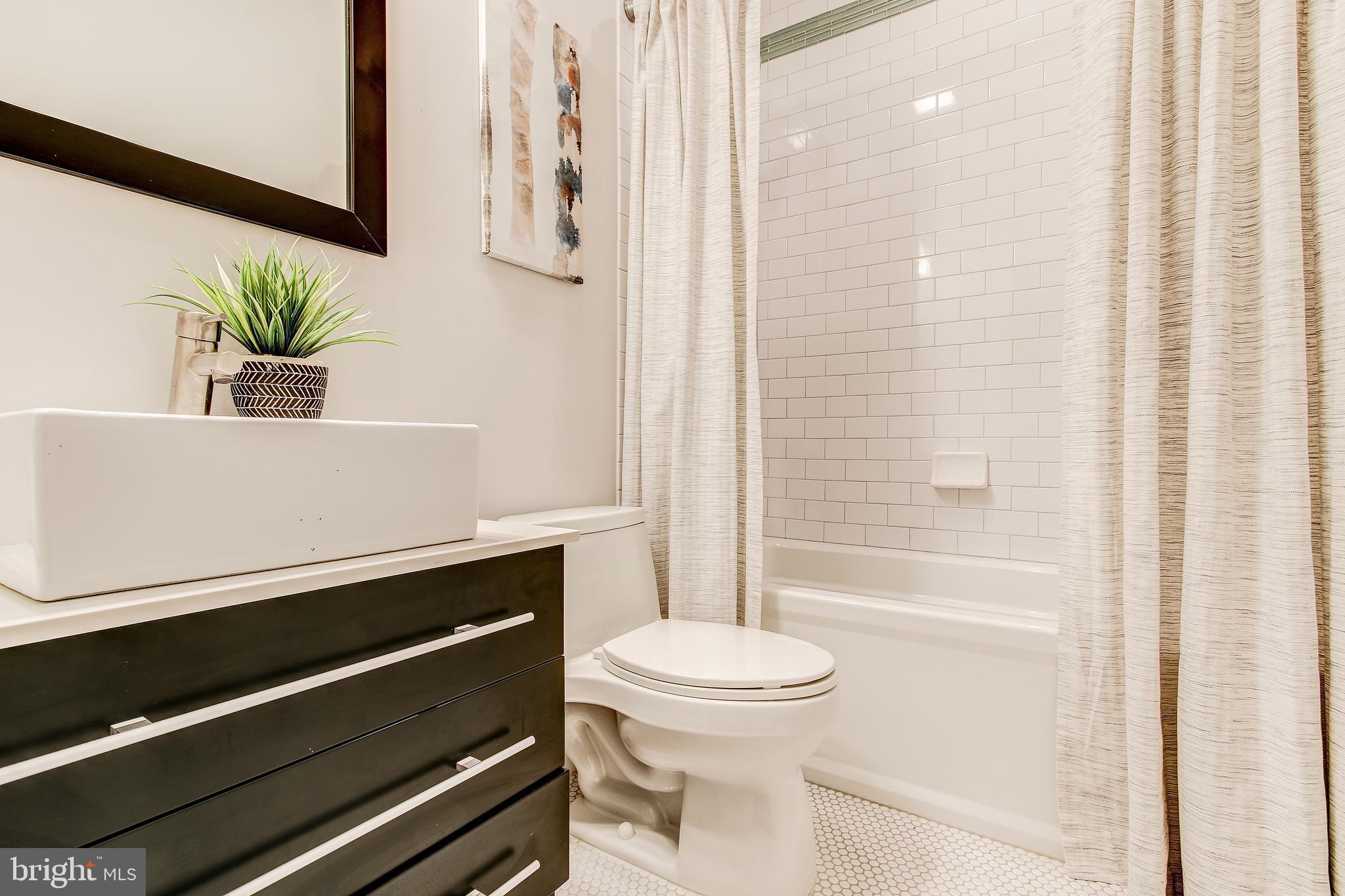 762 Park Road Northwest, Unit 4 Washington, DC 20010 - Photo 23 of 43 Upgraded Lux Hall Bath