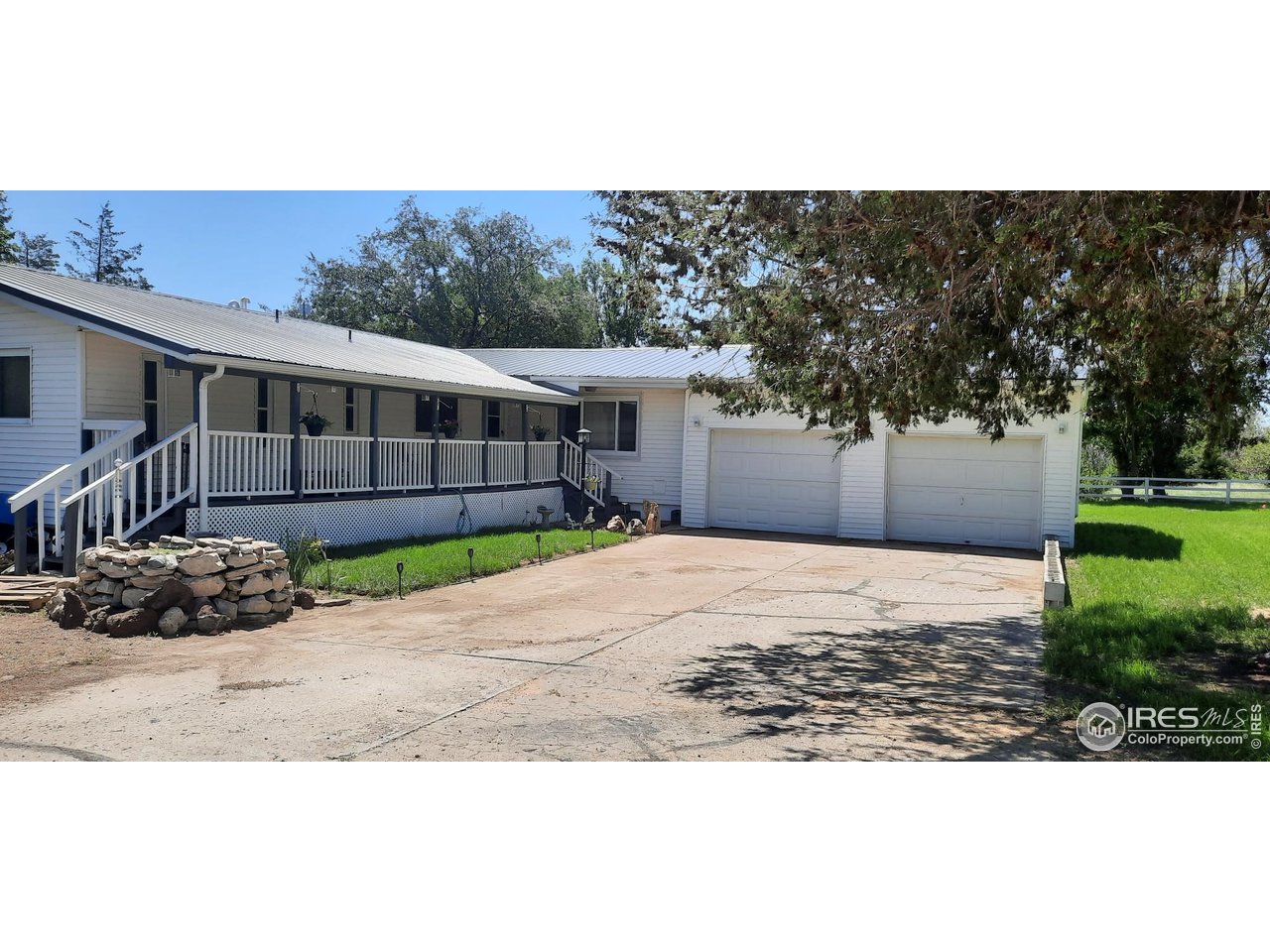 15296 County Road 39 Sterling, CO 80751 - Photo 2 of 26 a view of a backyard of the house